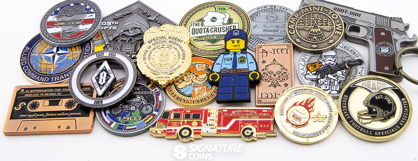 Custom challenge coins banner showing variety of plating, edges, and enamel styles