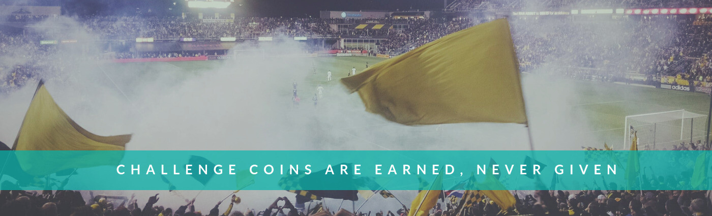 Custom soccer flipping coins lined up for a tournament