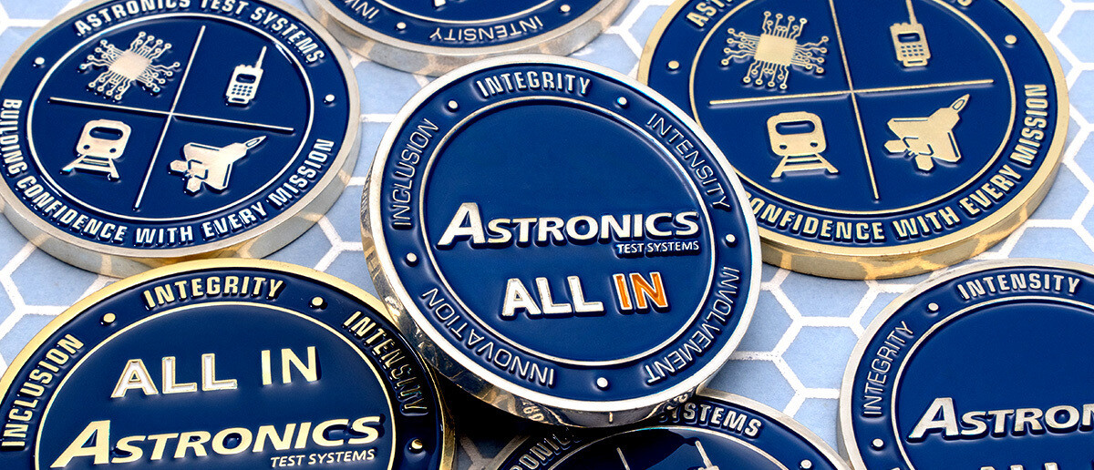 Blue and gold Astronics All In corporate challenge coins produced in bulk